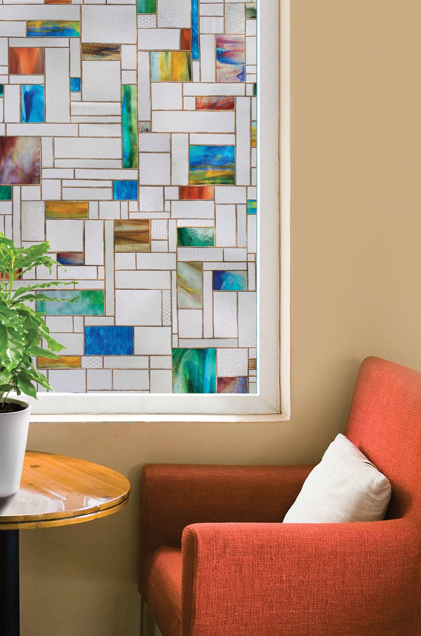 Modern square leaded glass window with pops of bright and saturated glass. The scale of this pattern lends itself well to a variety of window sizes and shapes. Really textured glass appearance.