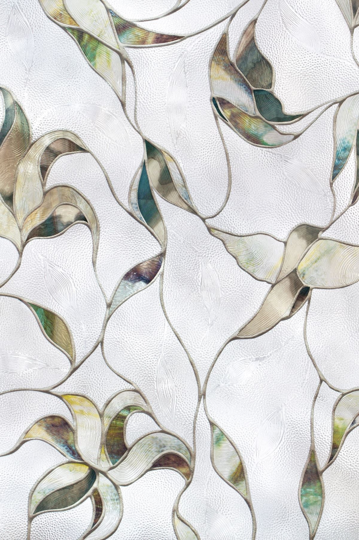 Light and airy, Flight adds sparkle and soft bits of colour to the home. If you look closely, hidden imagery of birds and butterflies can be found throughout this stylized design. A lovely addition to a children’s room or kitchen window.